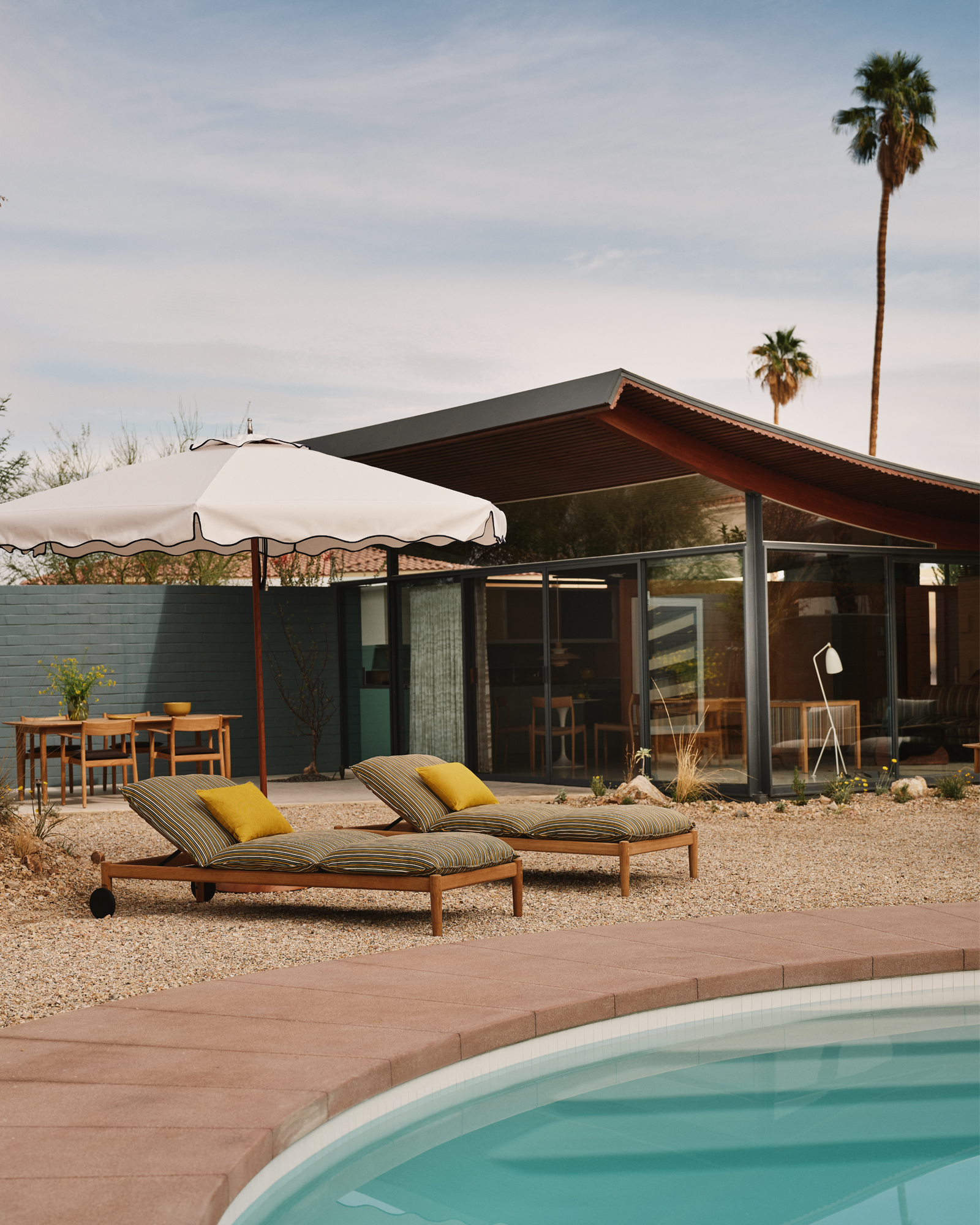 DWRXBoutique_house_Palm-Desert_California_exterior-pool-chairs.jpg